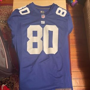 a Large Victor Cruz jersey and a XL Victor Cruz T-shirt